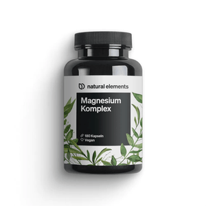 Una elegante botella negra etiquetada "Cápsulas Complejo de Magnesio" de NATURAL ELEMENTS promete apoyo muscular y mental. Contiene 180 cápsulas veganas adornadas con un diseño de hoja que complementa su esencia natural.