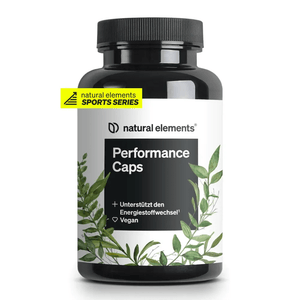 Una botella negra etiquetada "Performance Caps Capsules" de NATURAL ELEMENTS cuenta con una hoja verde y una etiqueta amarilla "Sports Series". Las cápsulas veganas, enriquecidas con cafeína, apoyan el metabolismo y están fortificadas con vitaminas B.